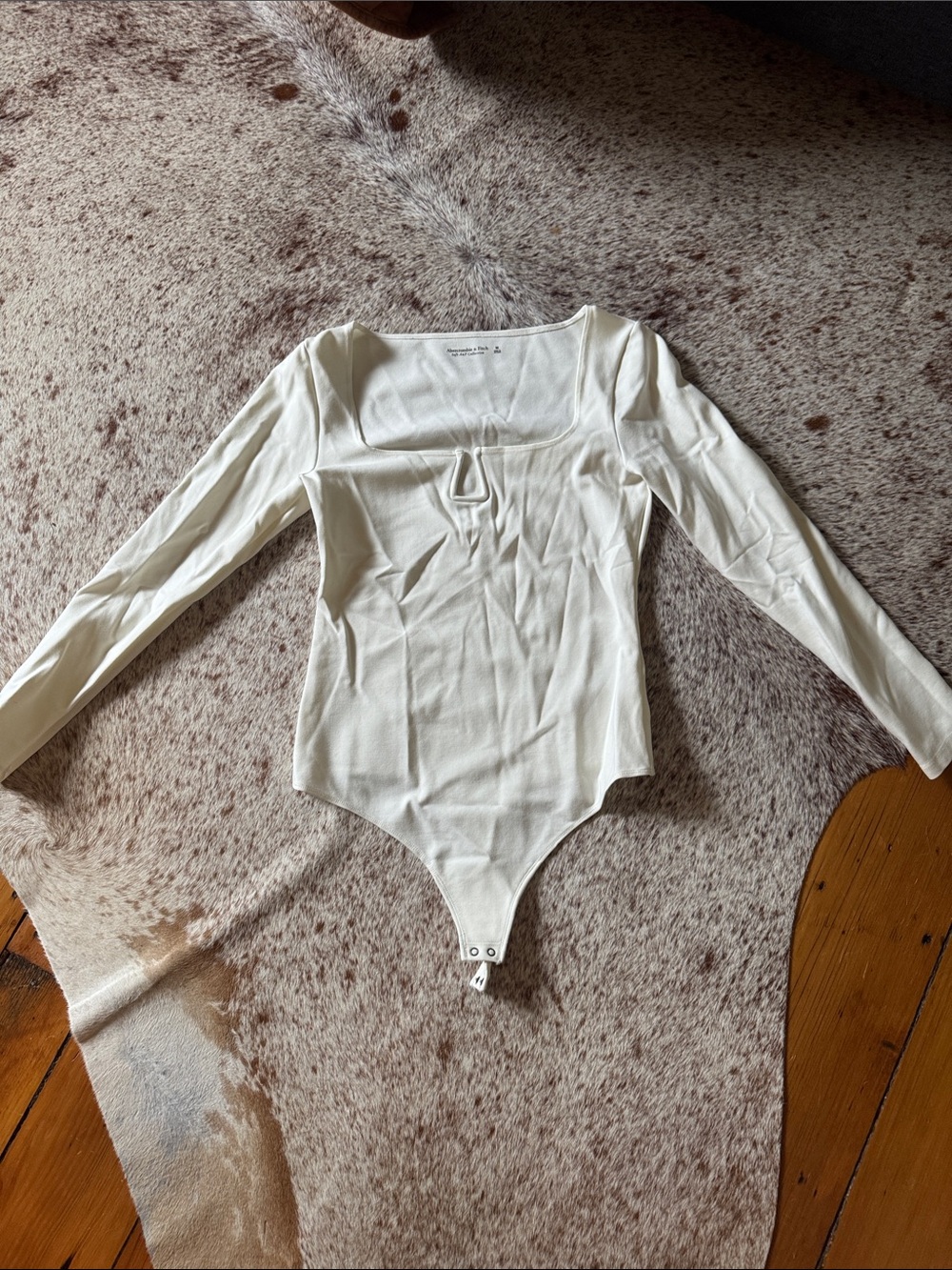 Abercrombie & Fitch Cream Square Neck Long Sleeve Bodysuit. Never worn